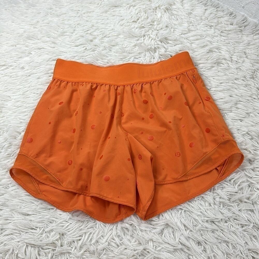 Lululemon Hotty Hot Short 4" *Logo Poco Logo Foil Amber Orange